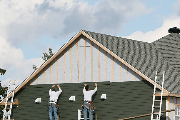 Professional Siding Replacement technician working in Enon, OH